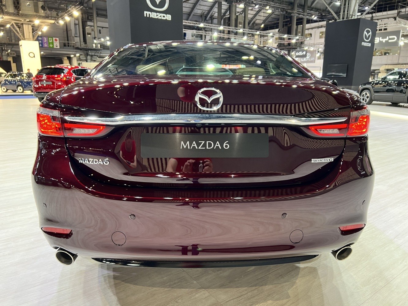 Sleek rear view with LED taillights and dual exhaust pipes