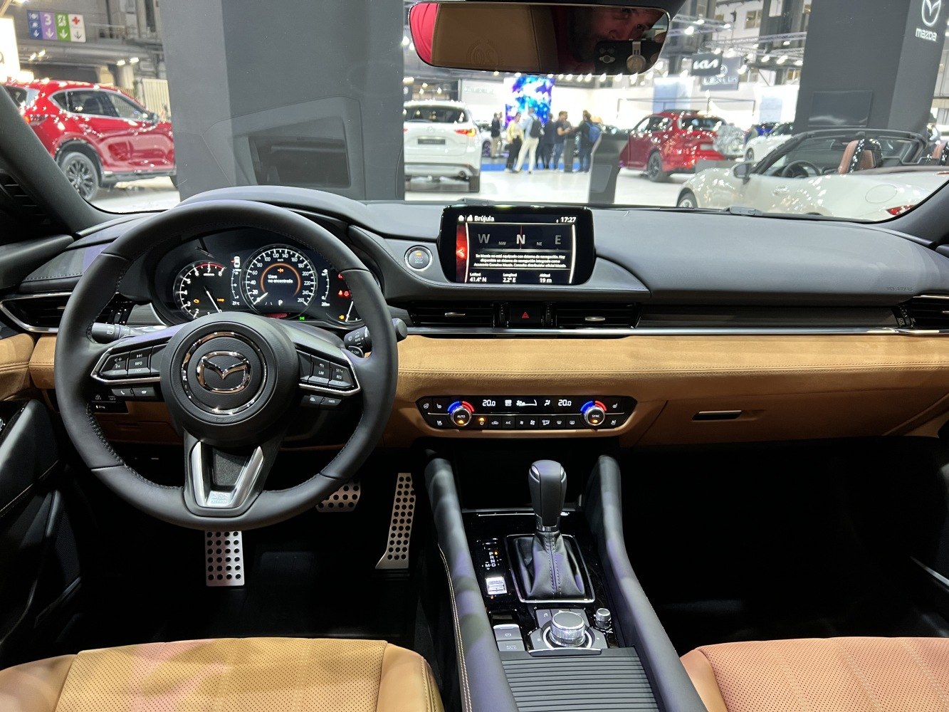 Dashboard and steering wheel with display screen and climate controls