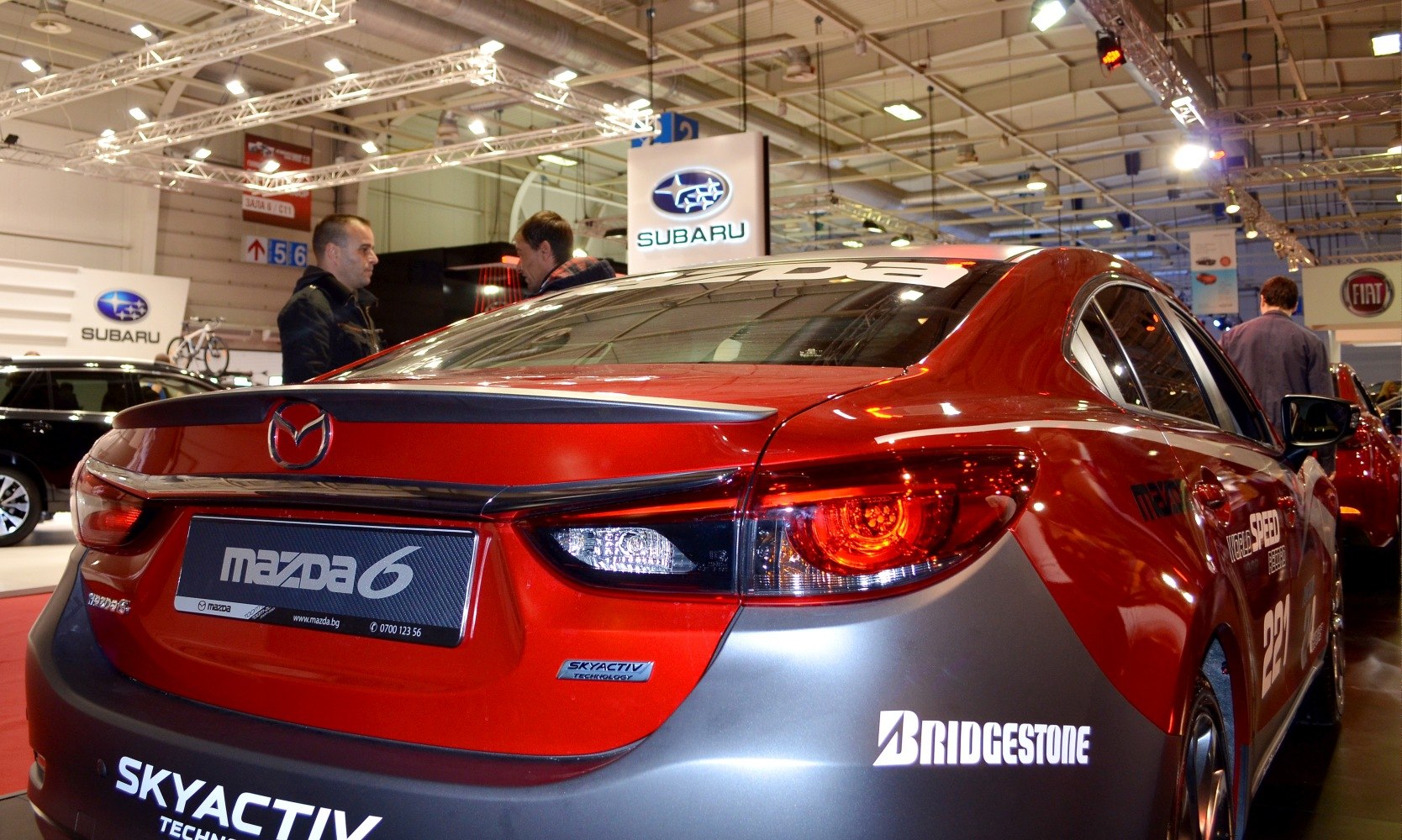 Rear design of a sedan with Skyactiv badge and distinctive taillights