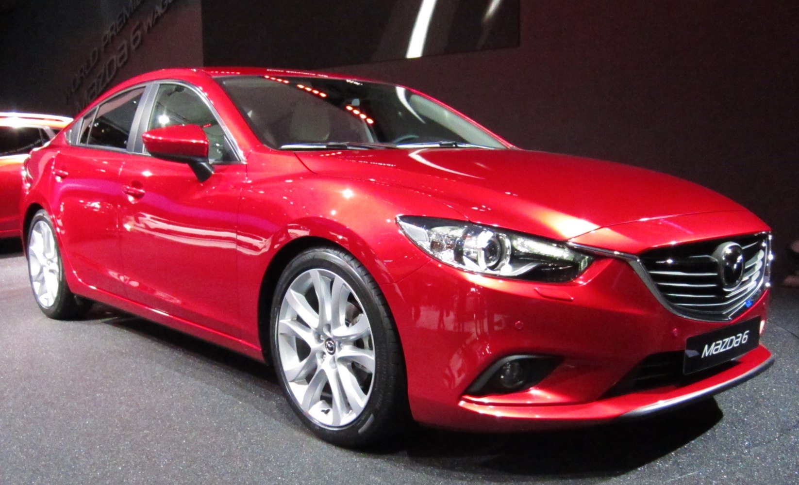 Sporty sedan with sleek LED headlights and alloy wheels