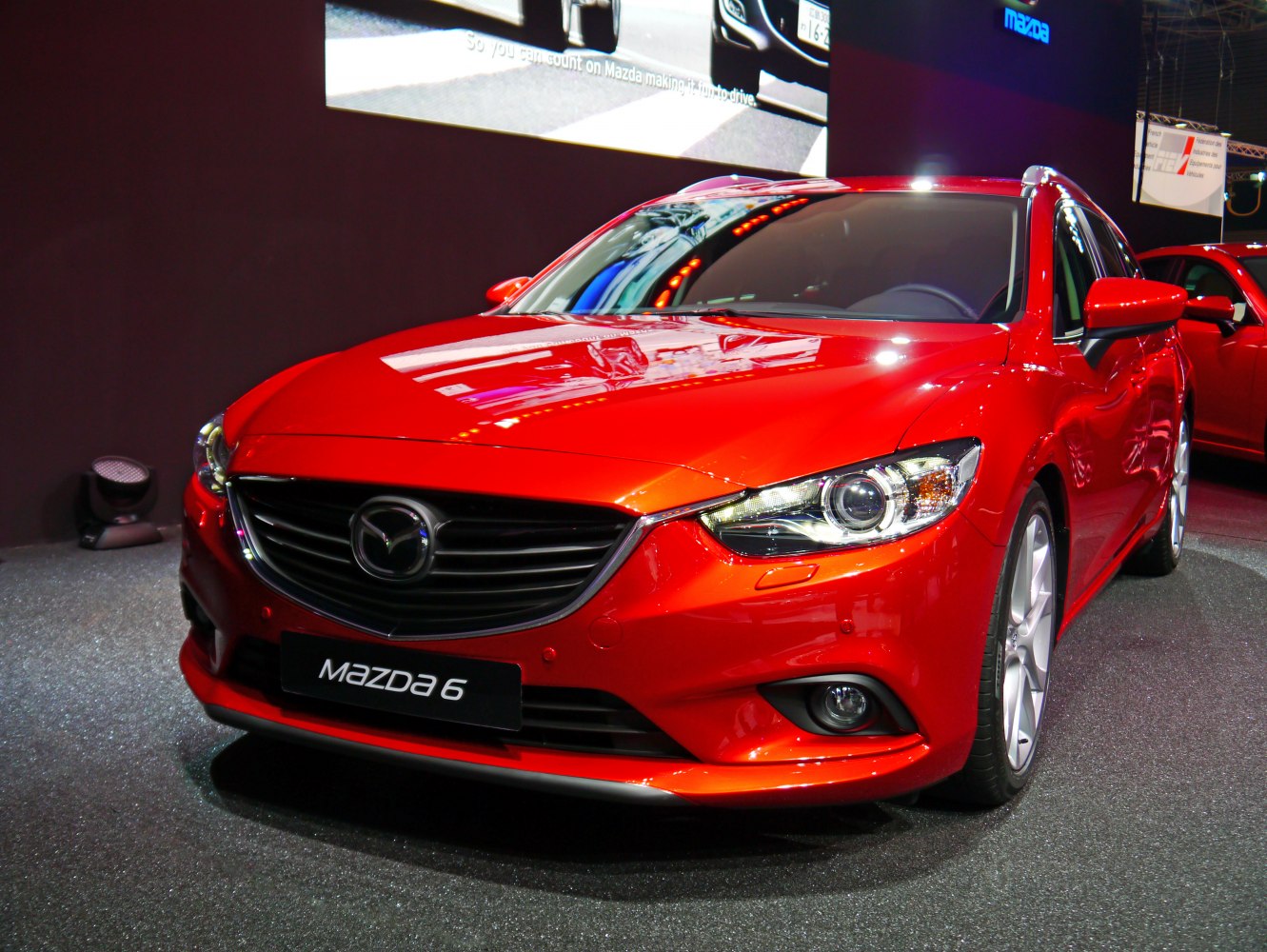 Sporty wagon front view with bold grille and LED projector headlights