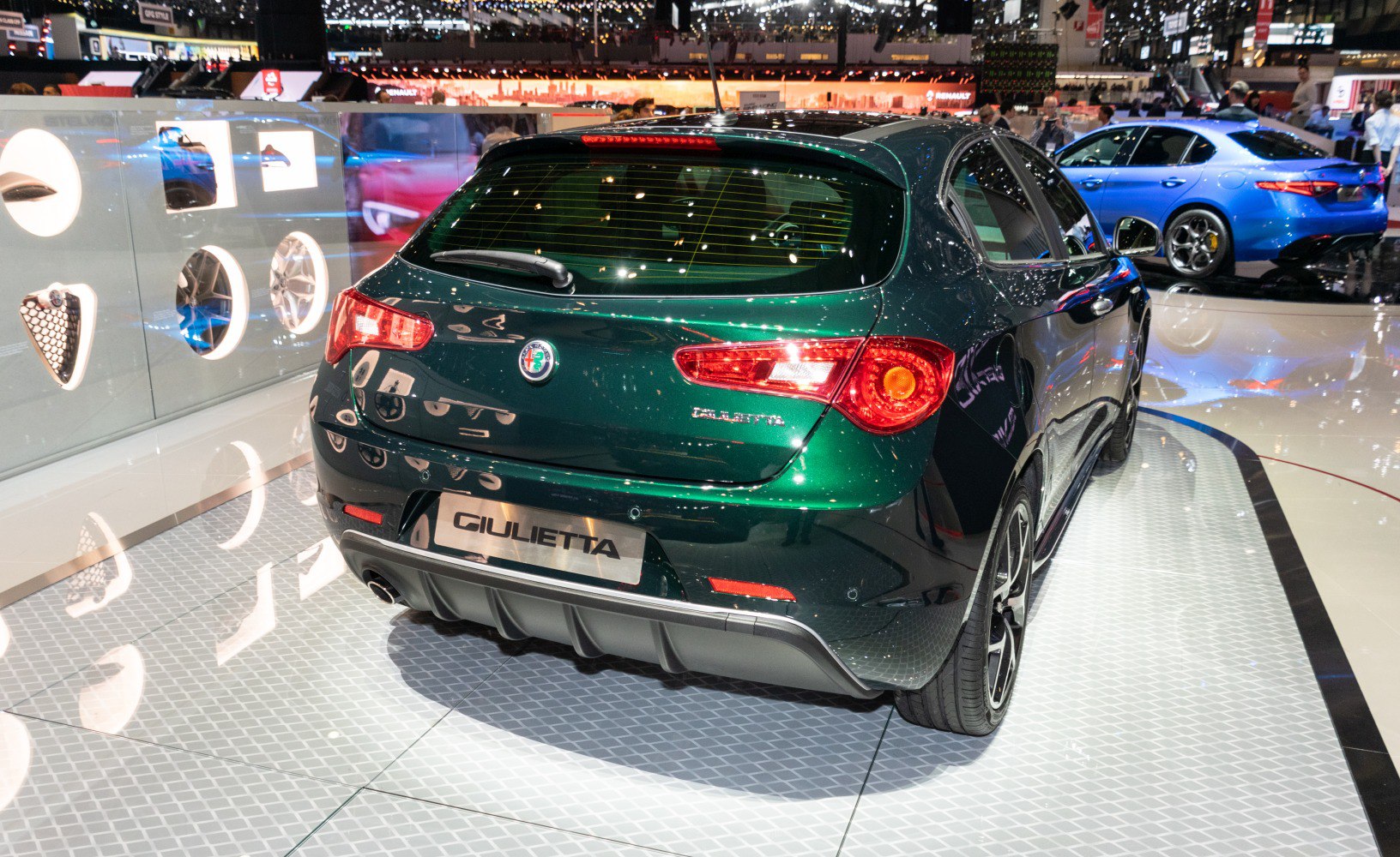 Rear view of hatchback with modern taillights and rear diffuser