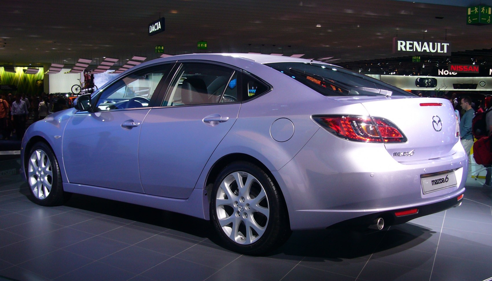 Rear and side view of hatchback with alloy wheels and distinct tail lights