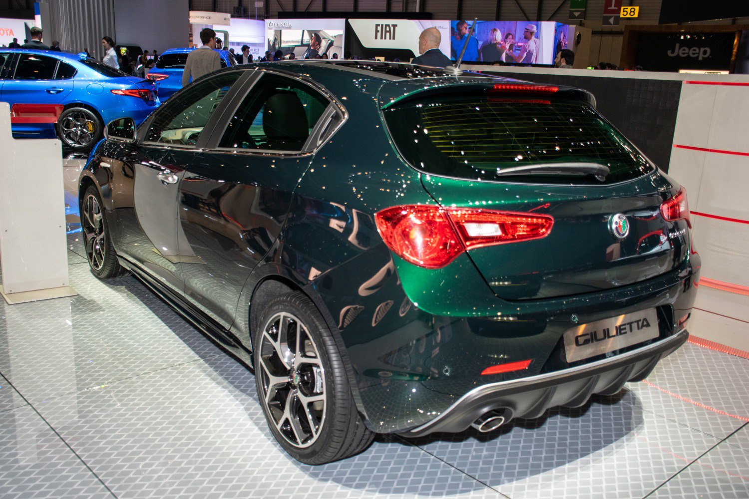 Rear and side view of sporty hatchback with alloy wheels
