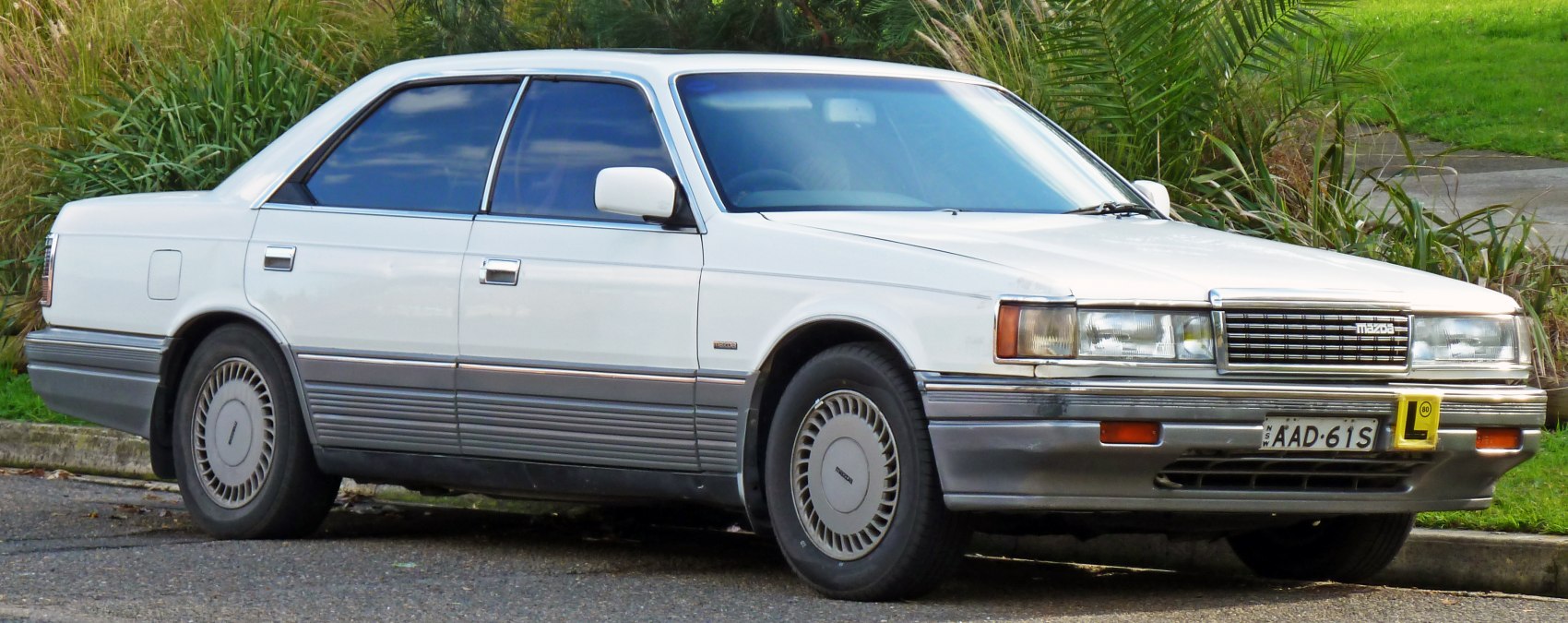 Angular sedan with horizontal headlights and classic 1980s styling
