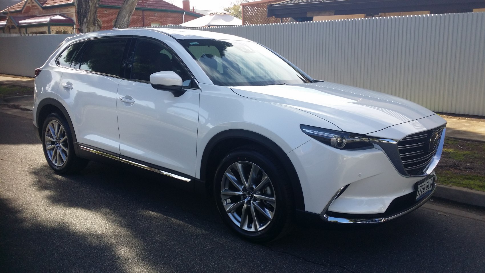 White SUV front side view with alloy wheels and sleek design