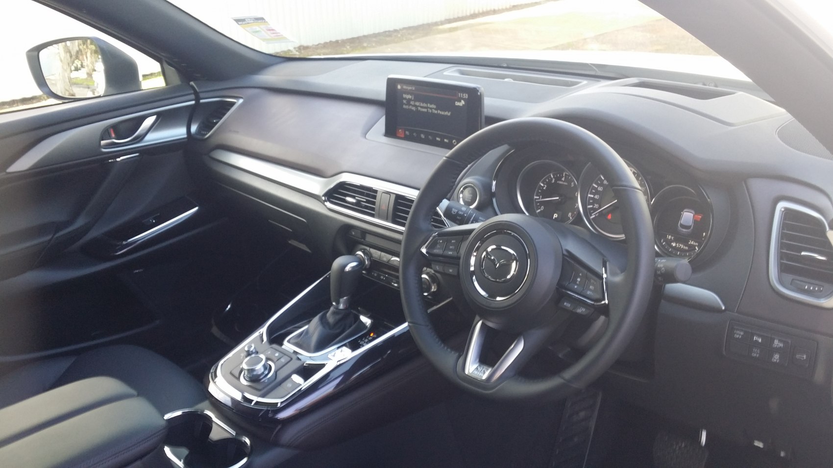 Dashboard, steering wheel, and center console interior details
