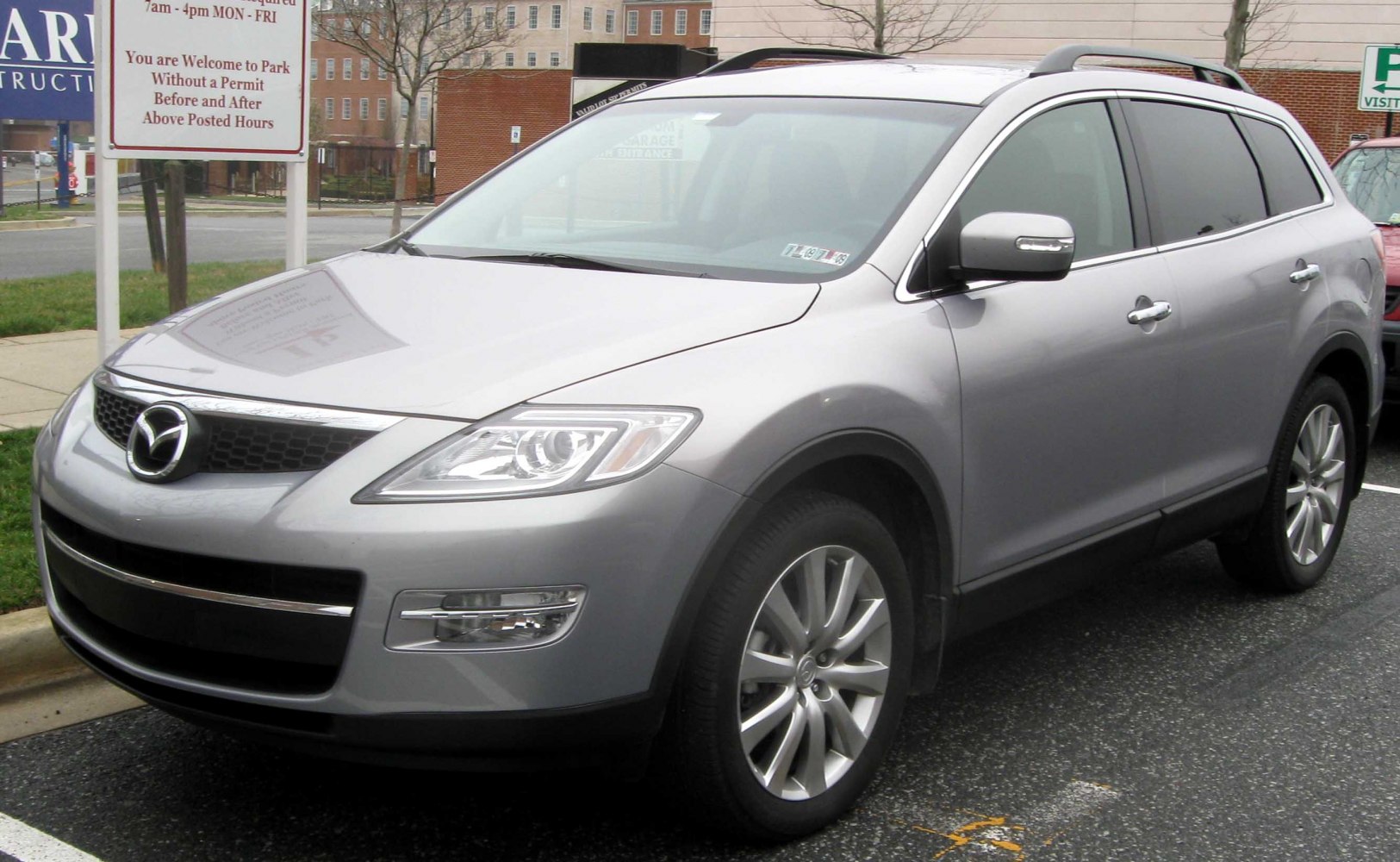 Front side view with sleek headlights and alloy wheels