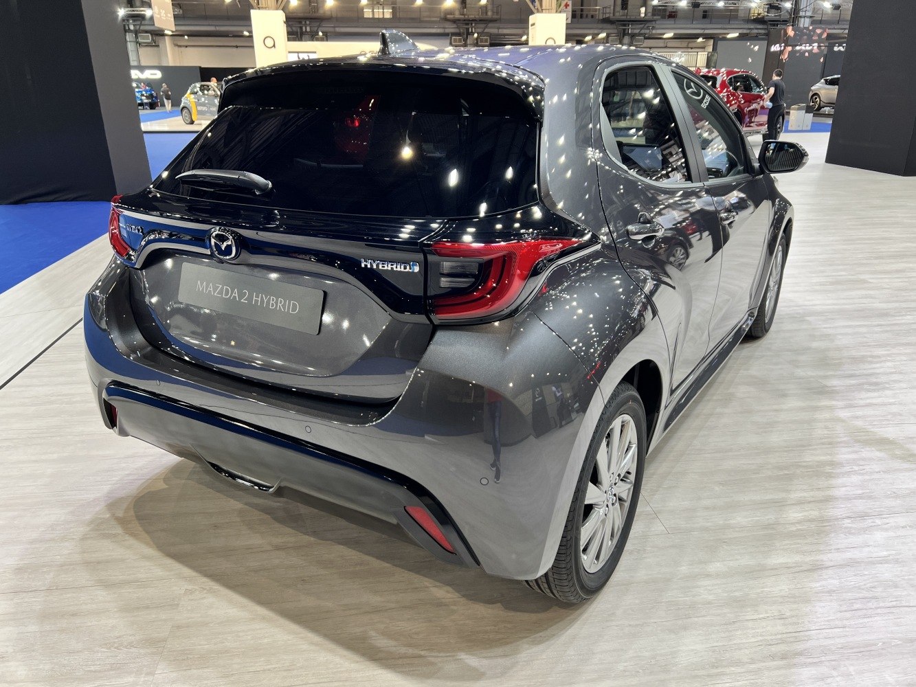 Rear view of compact hybrid hatchback with modern taillights and sleek design