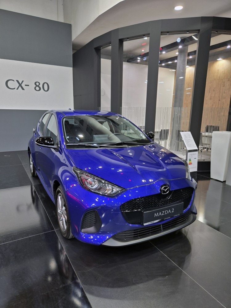 Front grille and sleek headlight design of a compact hatchback