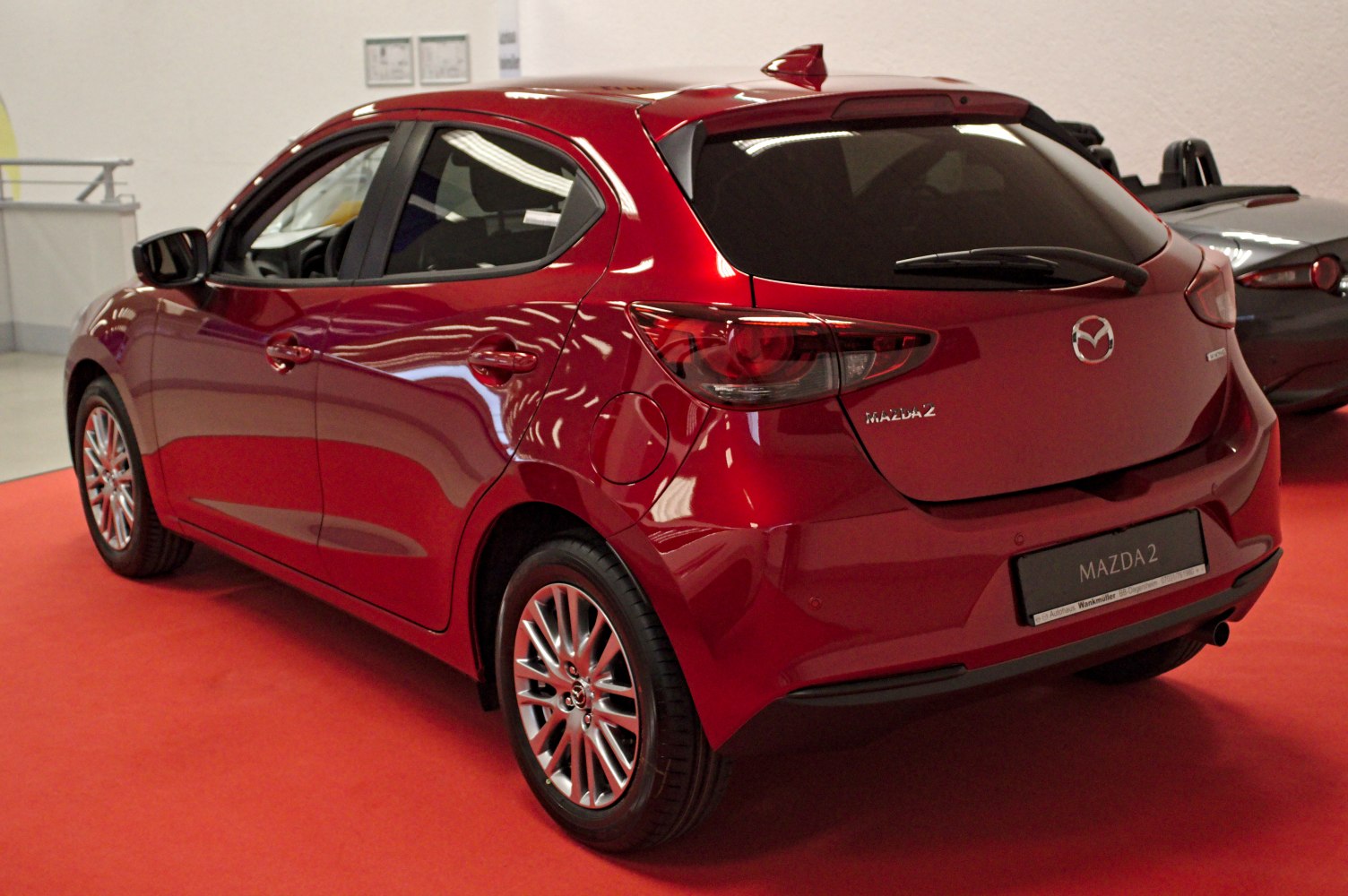 Rear view of hatchback with sleek tail lights and smooth design