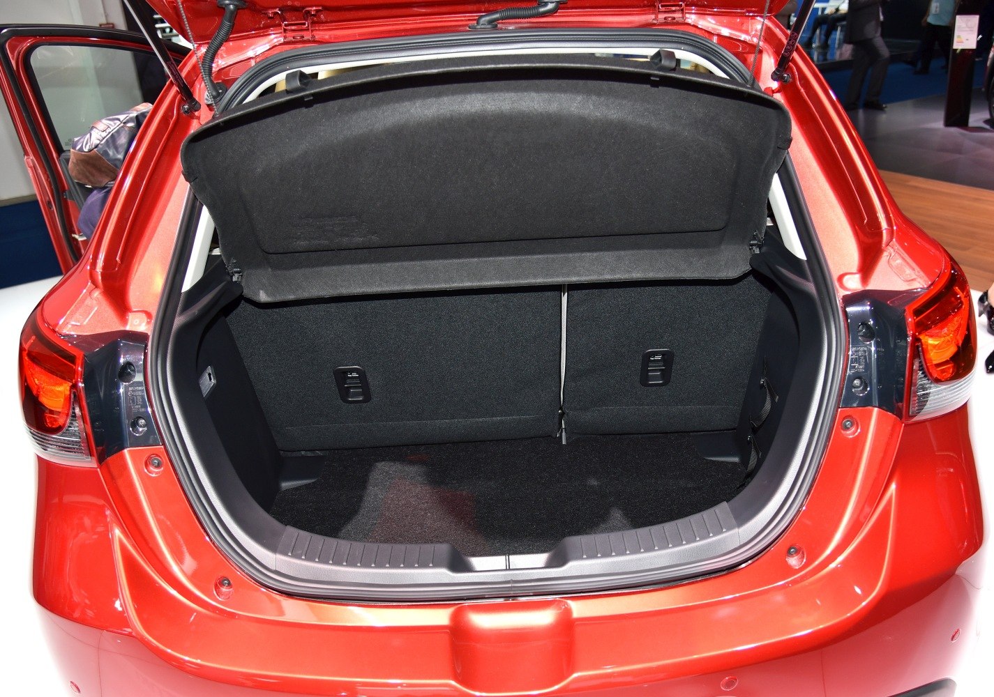 Spacious rear trunk interior of a hatchback with foldable back seats