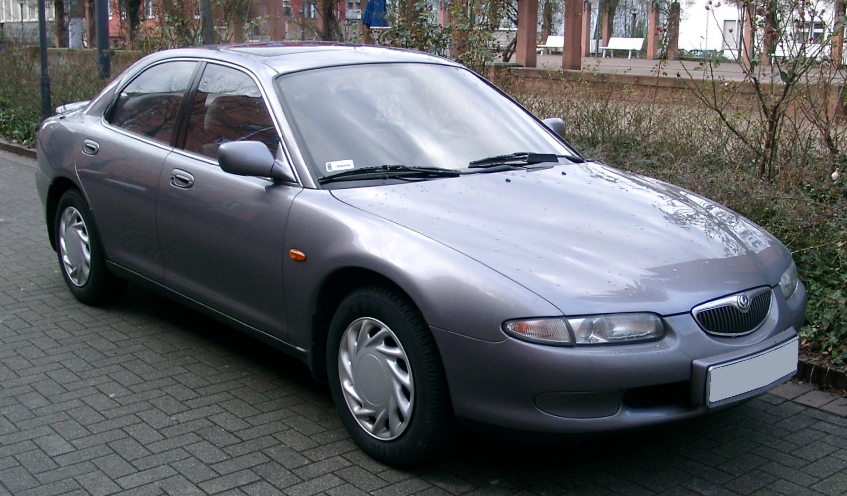 Front-side view with sleek headlights and smooth body lines