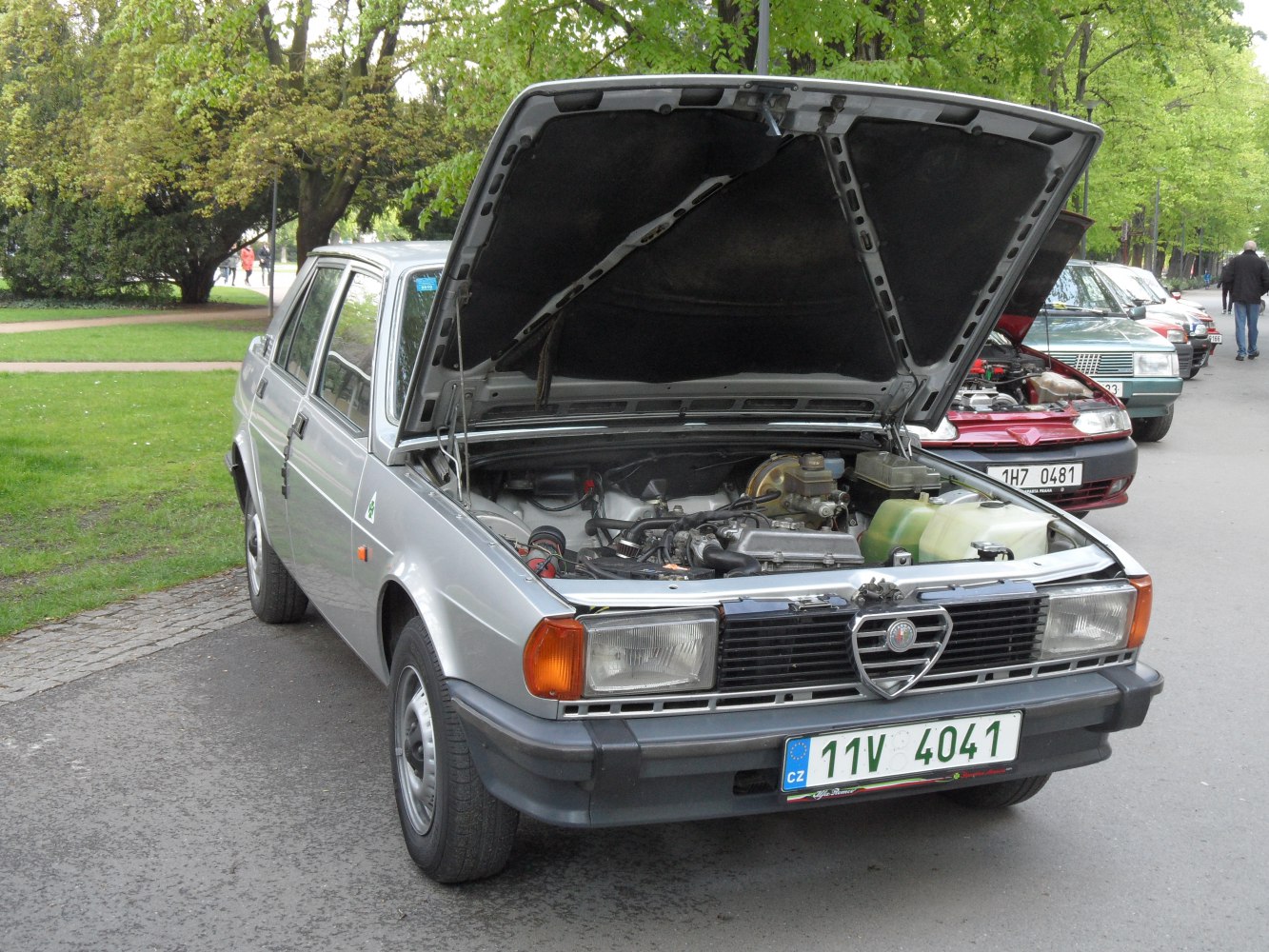 Alfa Romeo Giulietta 116 front with open hood and visible engine
