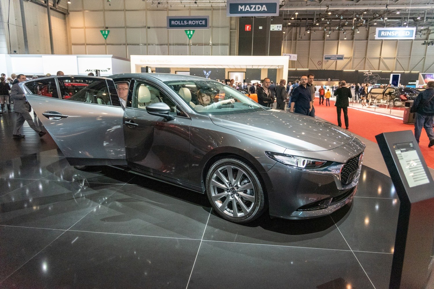 2019 sedan front side view with open rear door