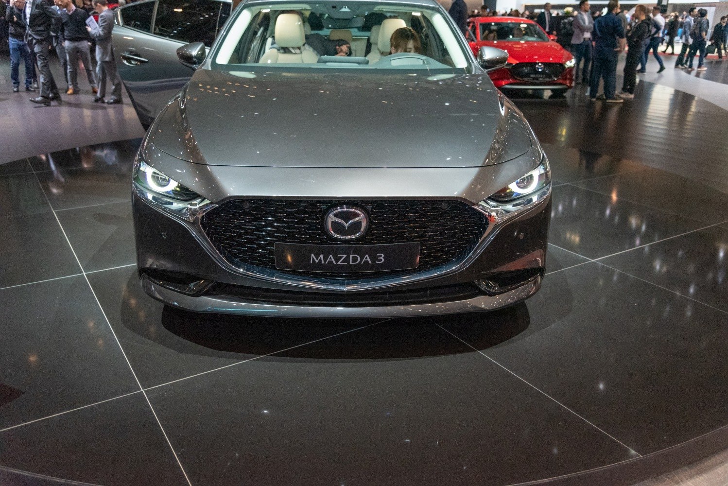 Front view with prominent grille and LED headlights
