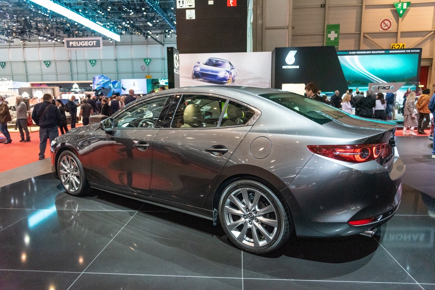 Rear-side view of 2019 sedan with alloy wheels