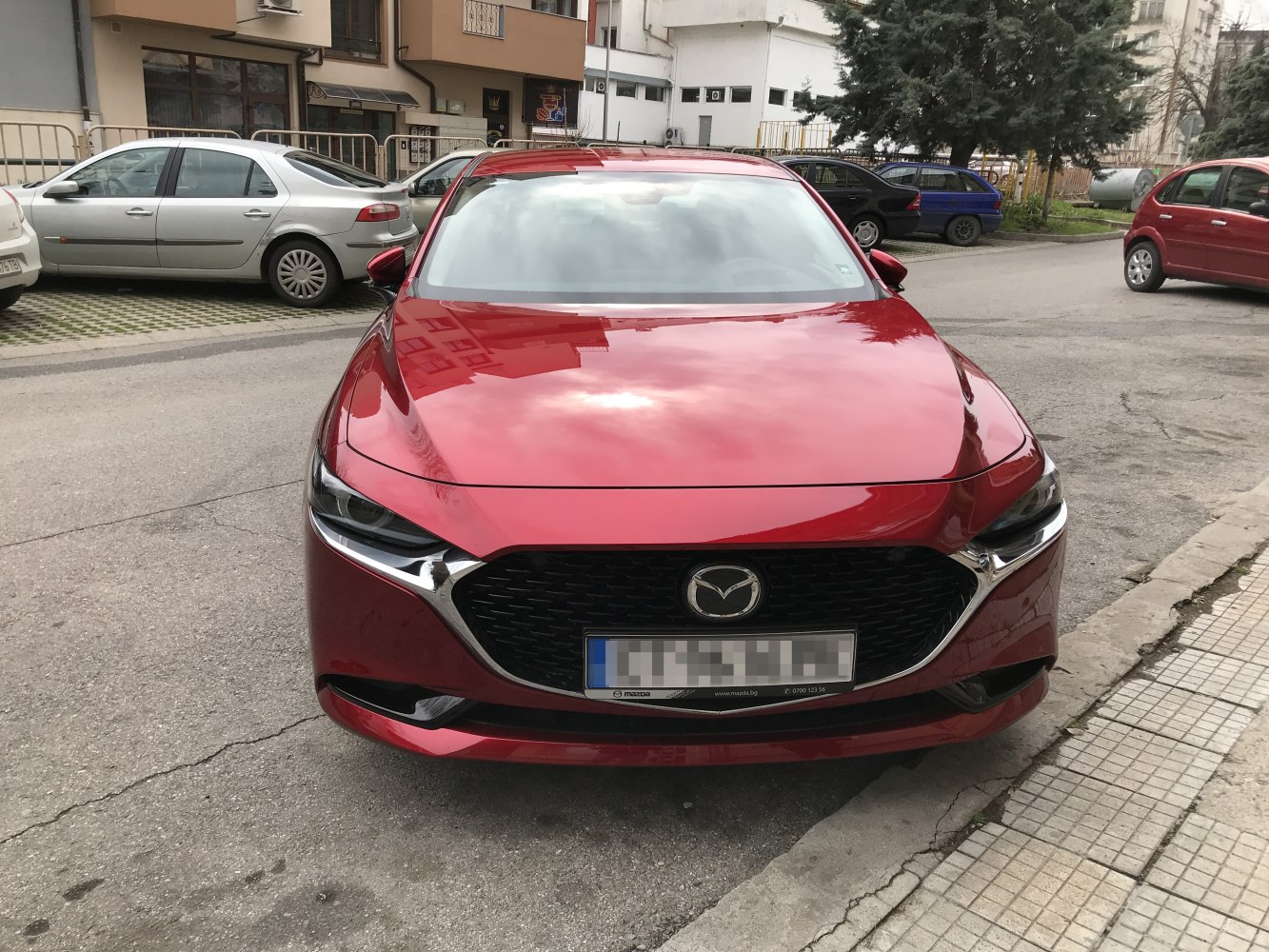 Front view with sleek grille and sharp headlights