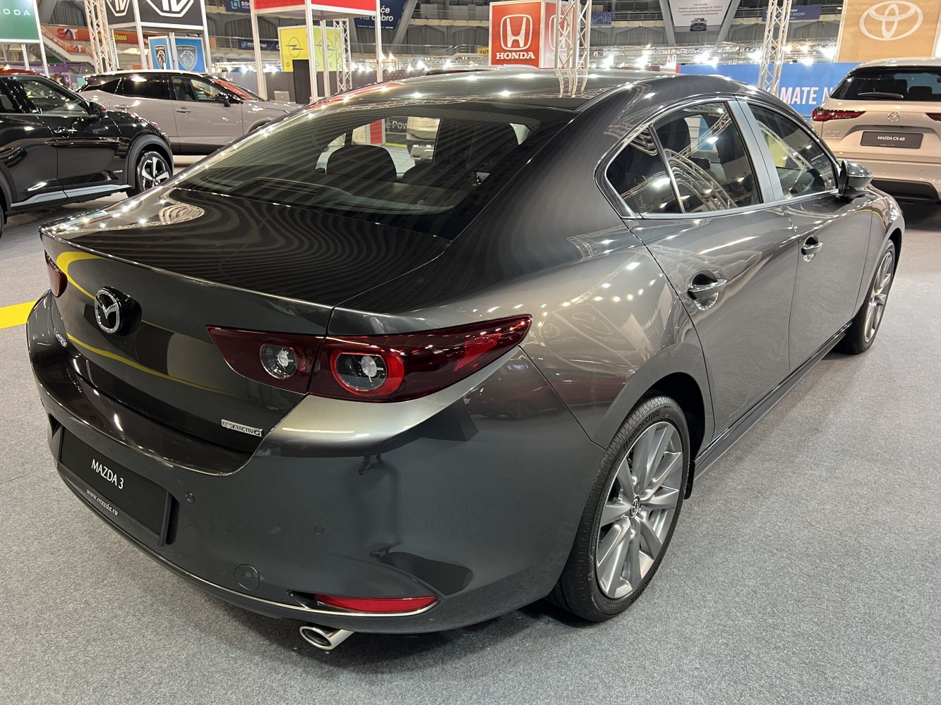 Rear view with sleek taillights and alloy wheels