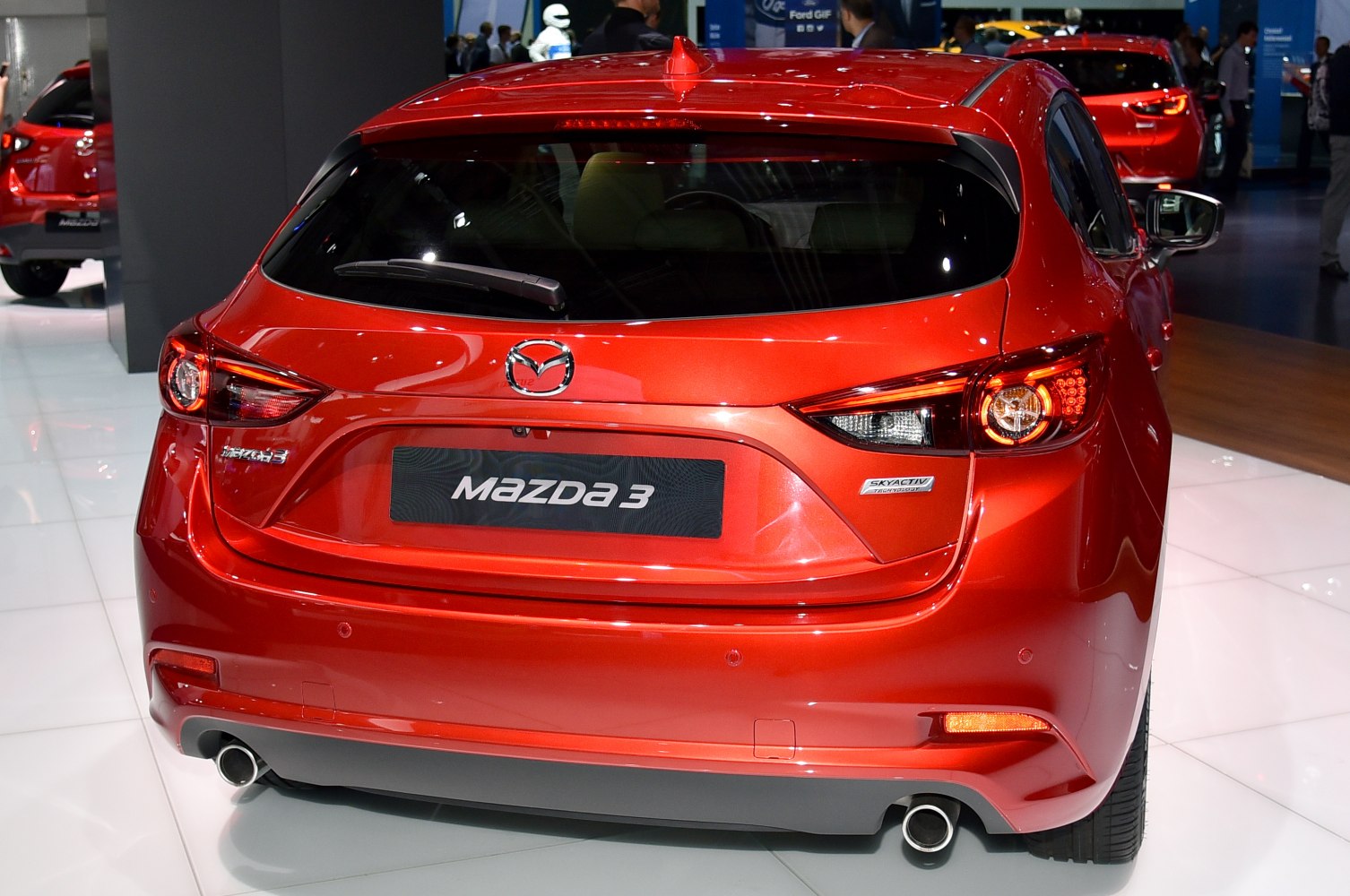 Rear view of hatchback with dual exhausts and unique taillight design