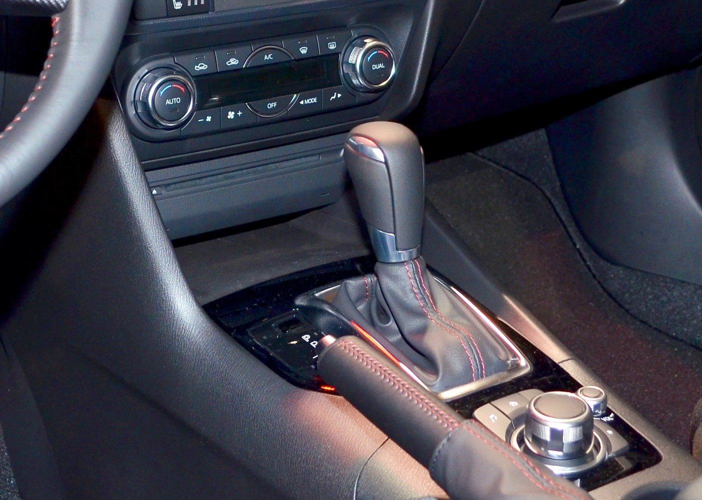 Automatic gear shift lever, handbrake, and climate controls with dual-zone feature
