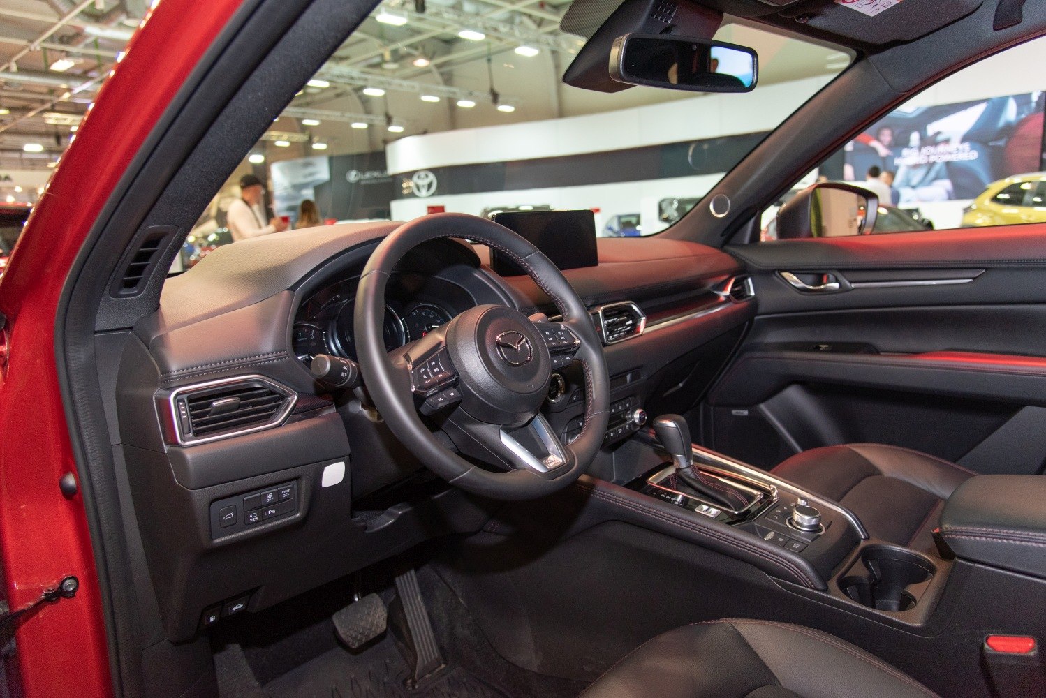 Interior dashboard and multifunction steering wheel with infotainment screen