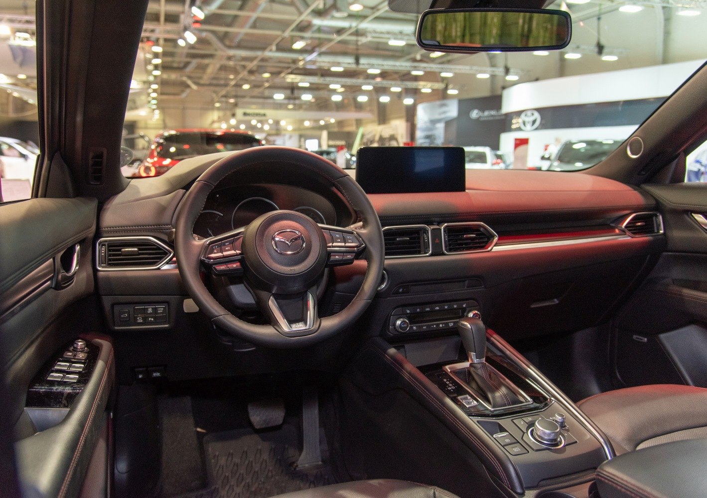 Modern dashboard and steering wheel with digital display and controls