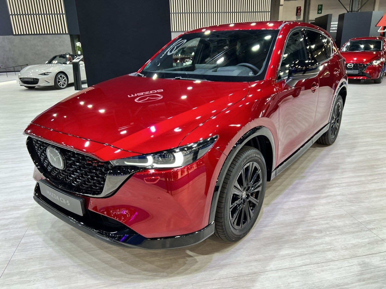 SUV with LED headlights and black mesh grille design