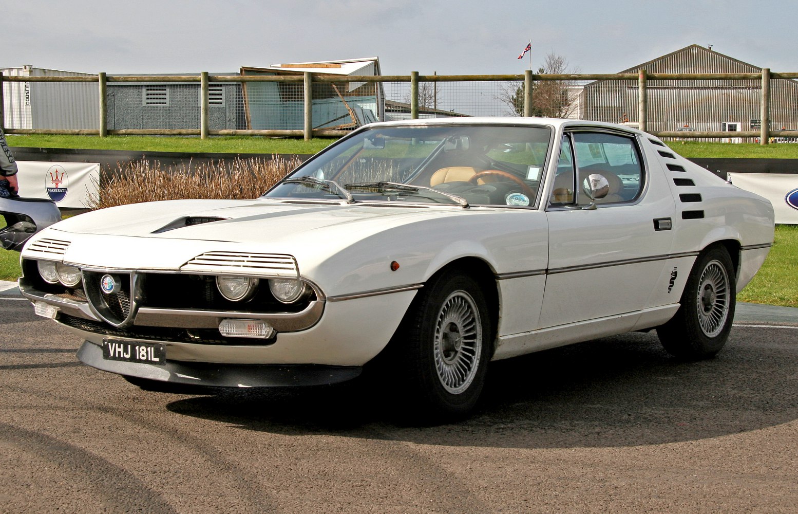 Distinctive 1970s sports coupe with headlight grilles and side vents