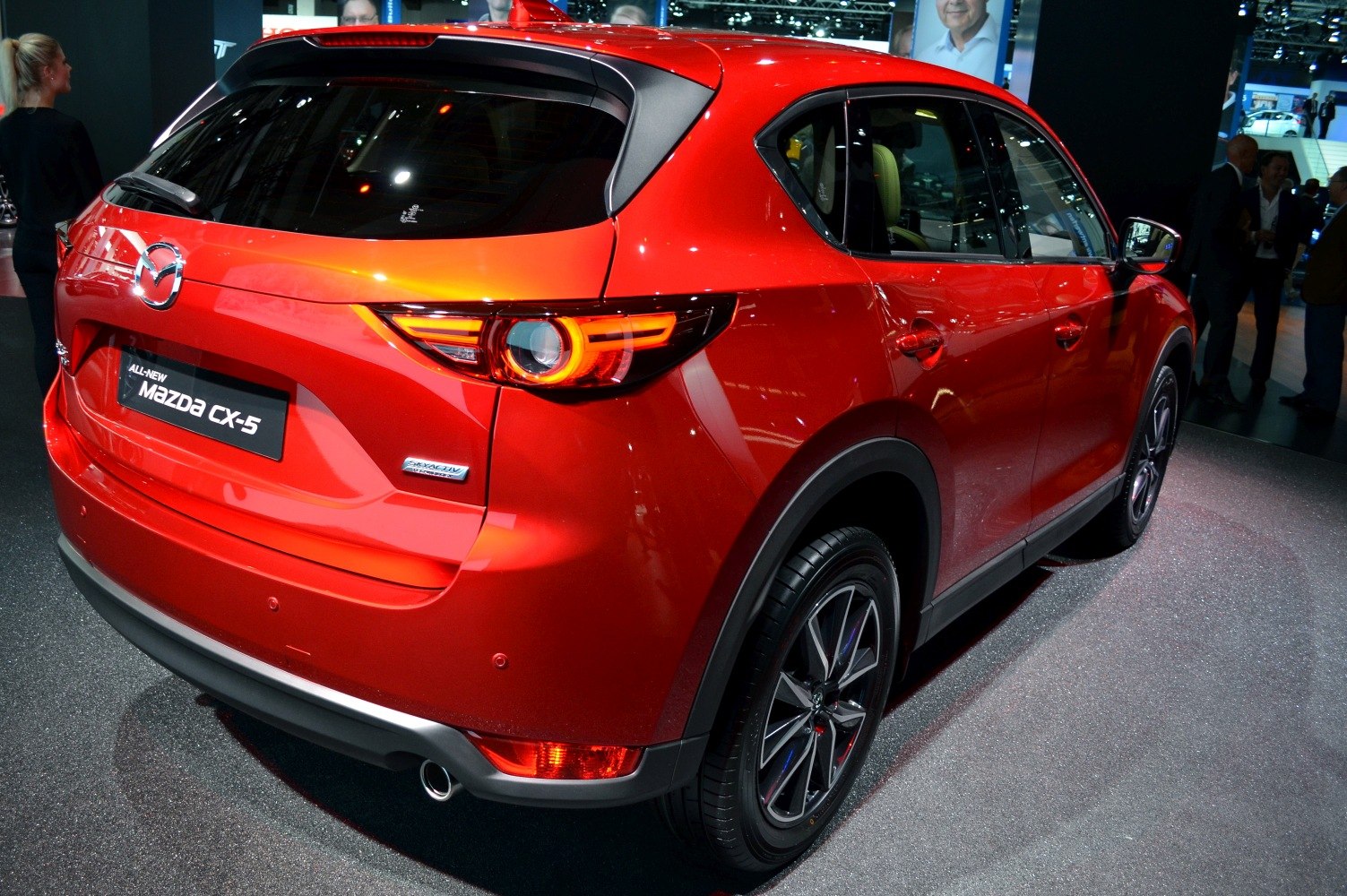 Sleek rear design with distinctive taillights and alloy wheels