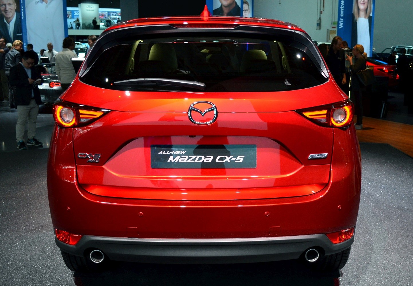 Rear view with signature tail lights and dual exhaust