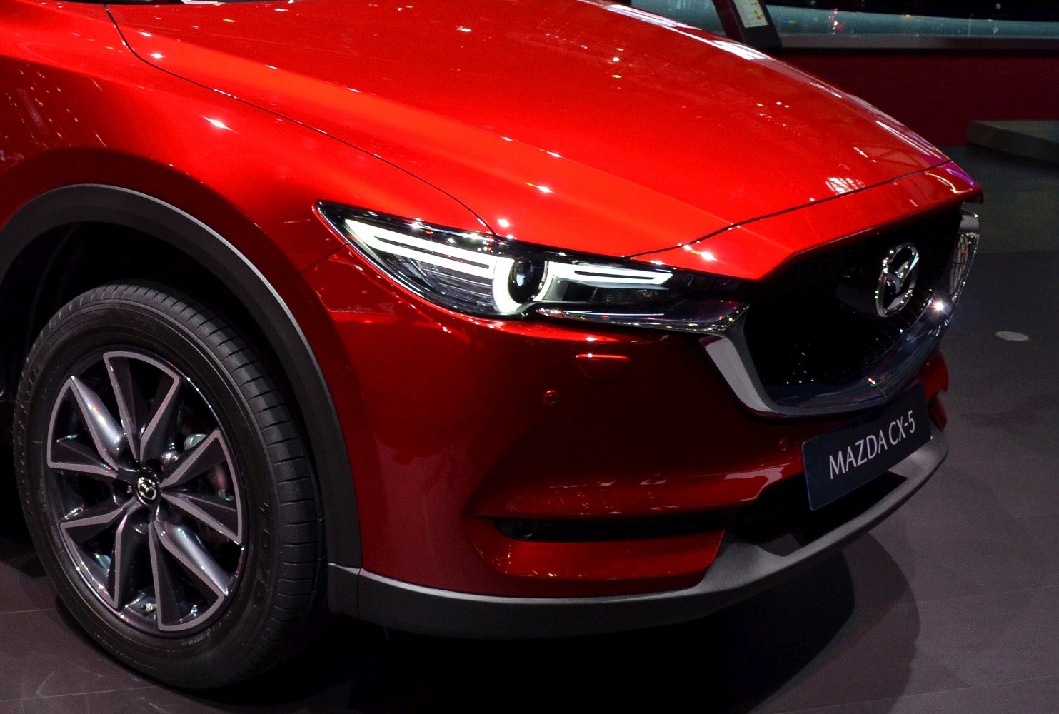 LED front headlight and alloy wheel close-up