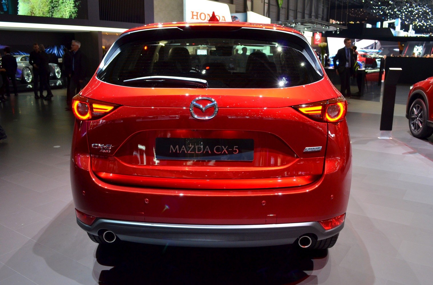 Rear view with circular taillights and dual exhausts