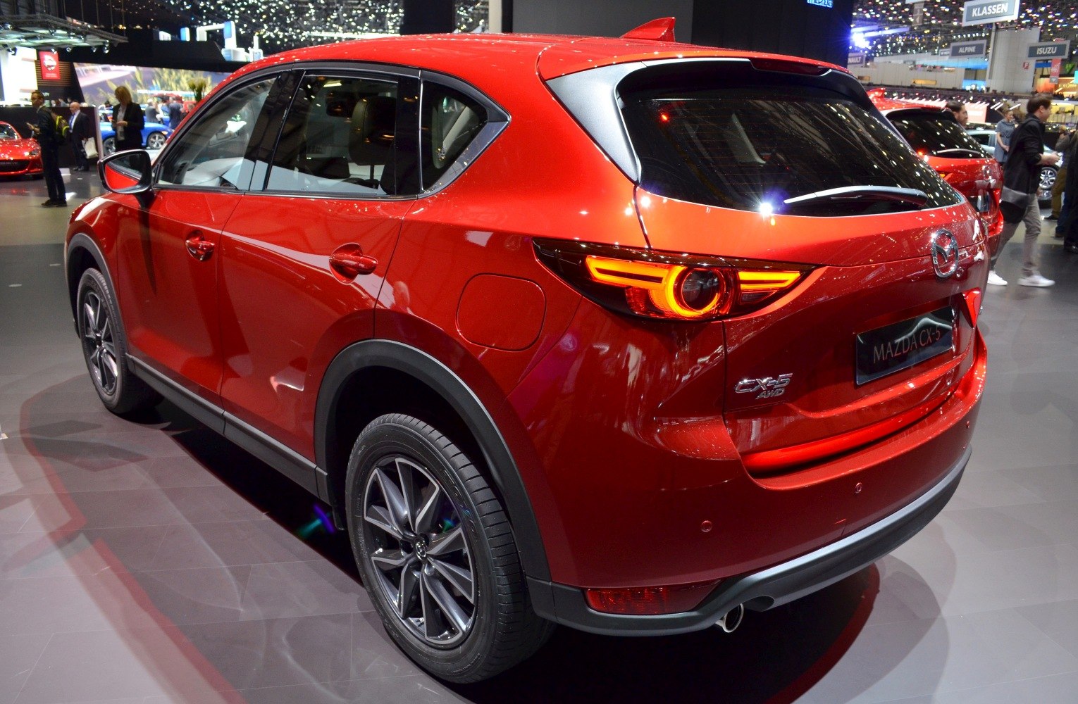 SUV rear side with round LED tail lights and alloy wheels