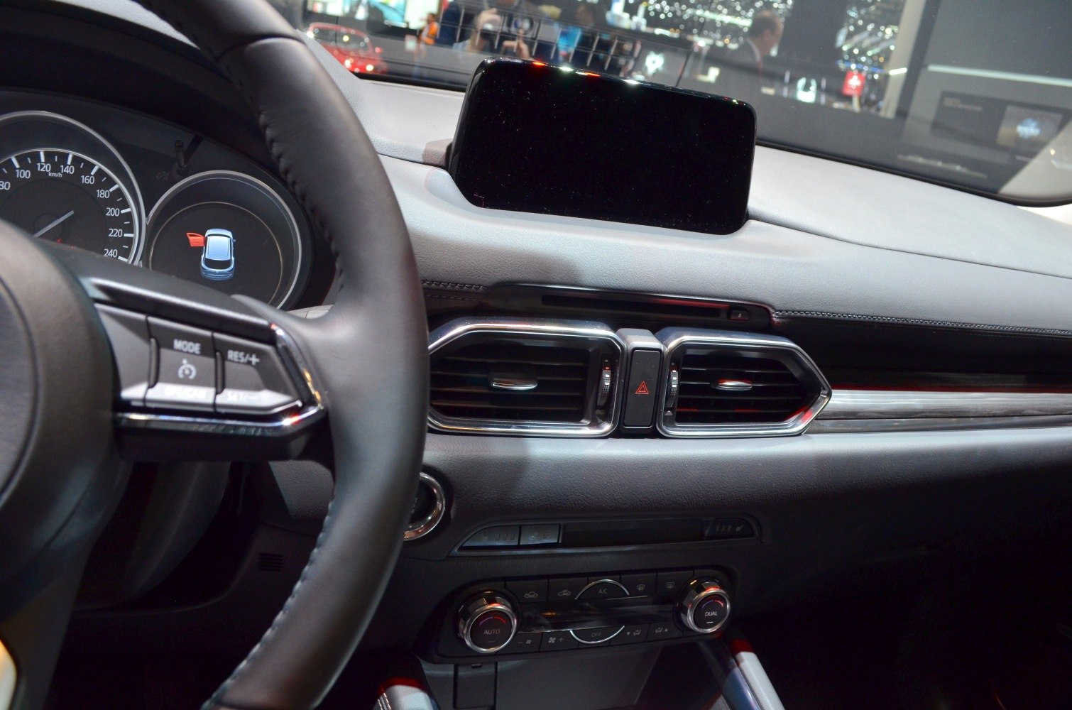 Dashboard with infotainment screen and steering wheel controls