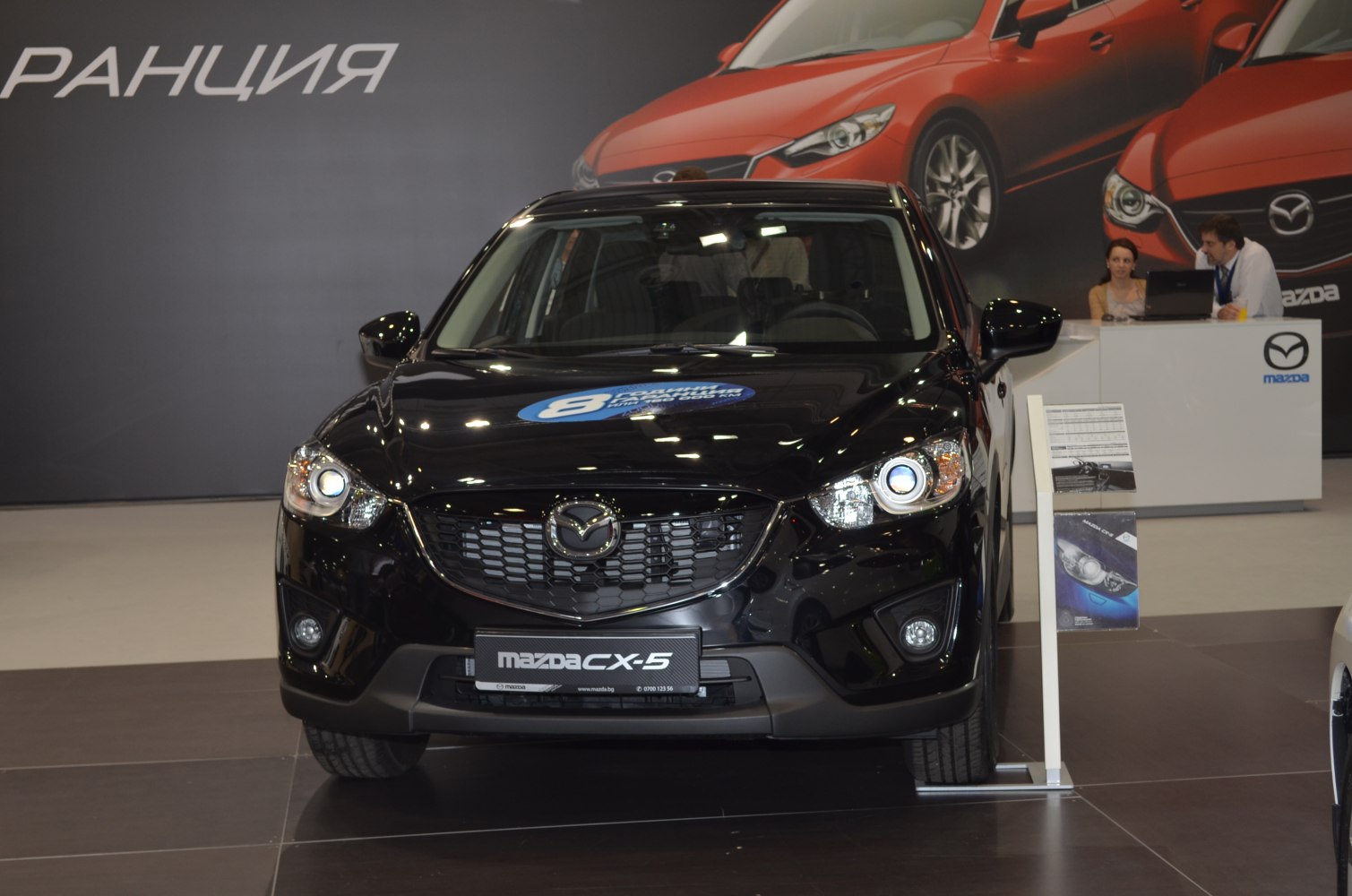 Front view with signature grille and headlights