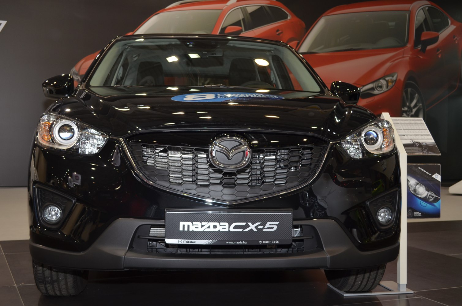 Front grille with Mazda badge and circular headlights