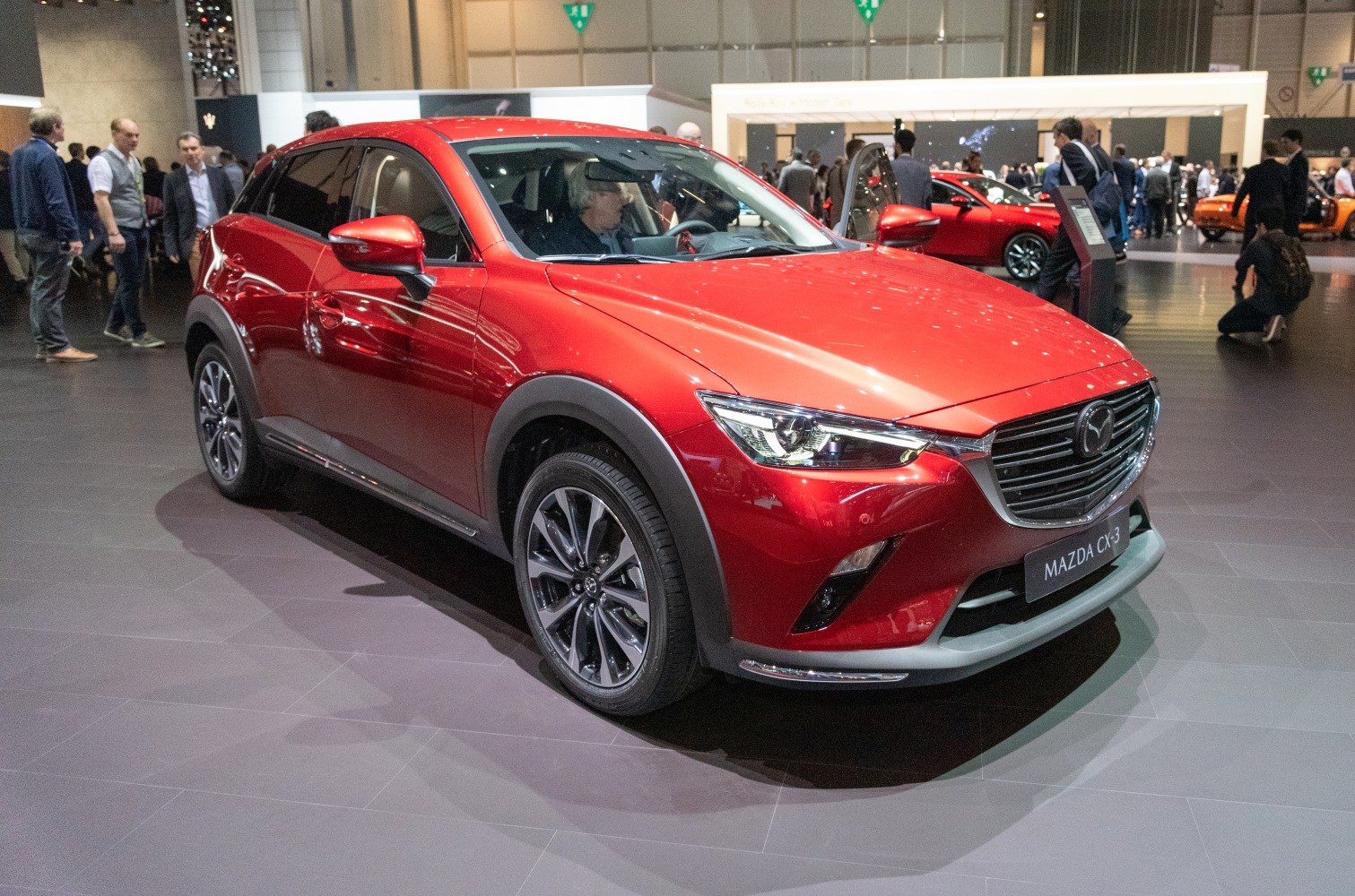 Front and side view with LED headlights and alloy wheels