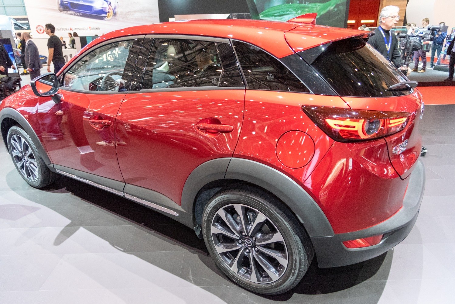 Rear side profile with alloy wheels and taillights