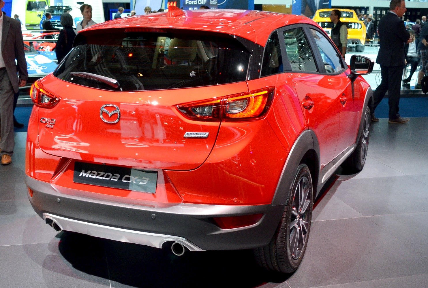 Rear view of compact SUV with LED tail lights and dual exhaust