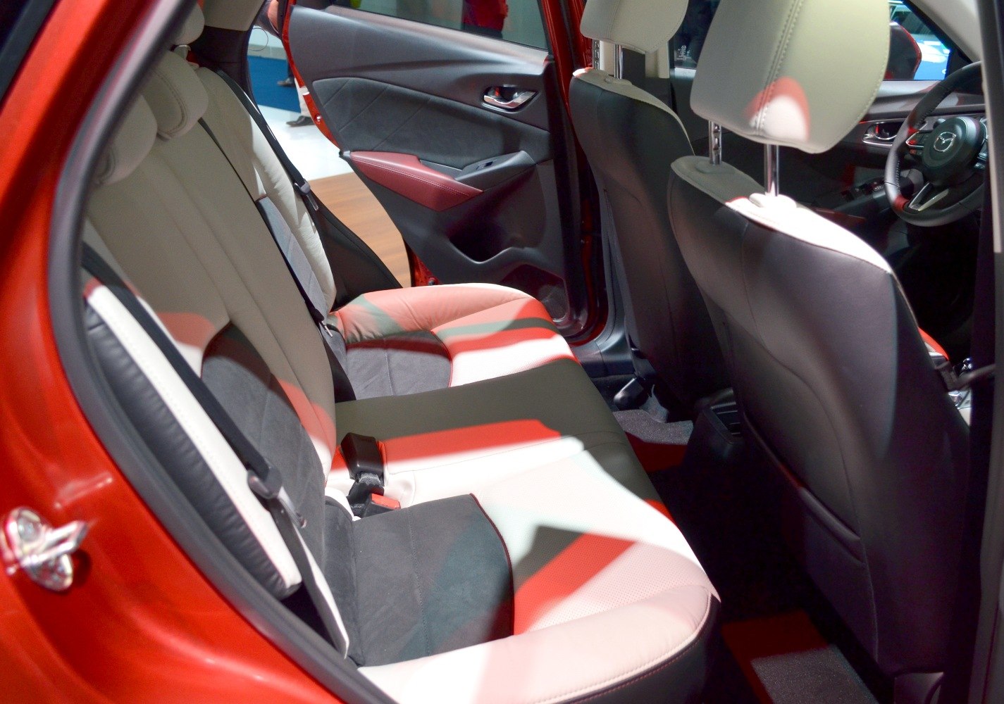 Rear seating and door panel interior design with leather upholstery