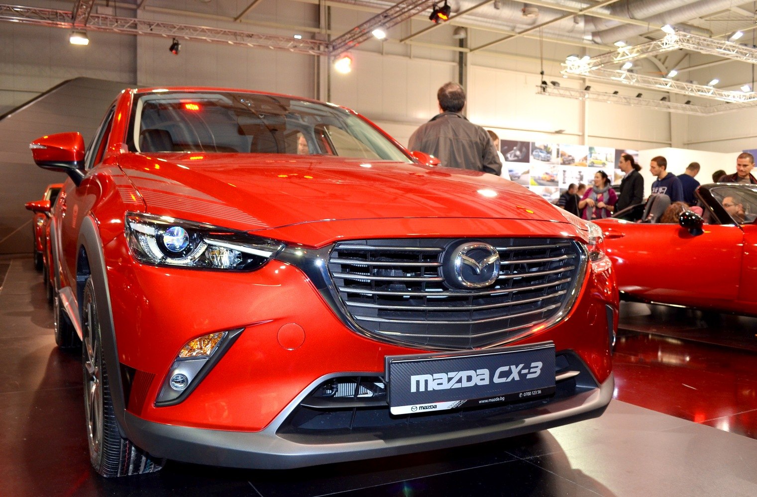 Front grille and headlight close-up with sleek design and modern details