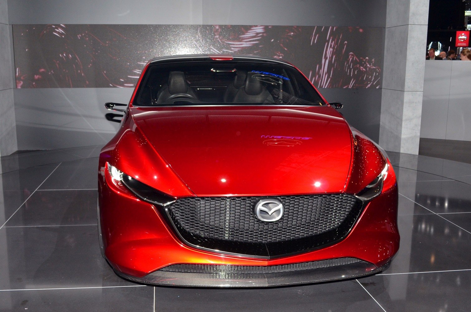 Sleek aerodynamic front with bold grille and sharp headlights
