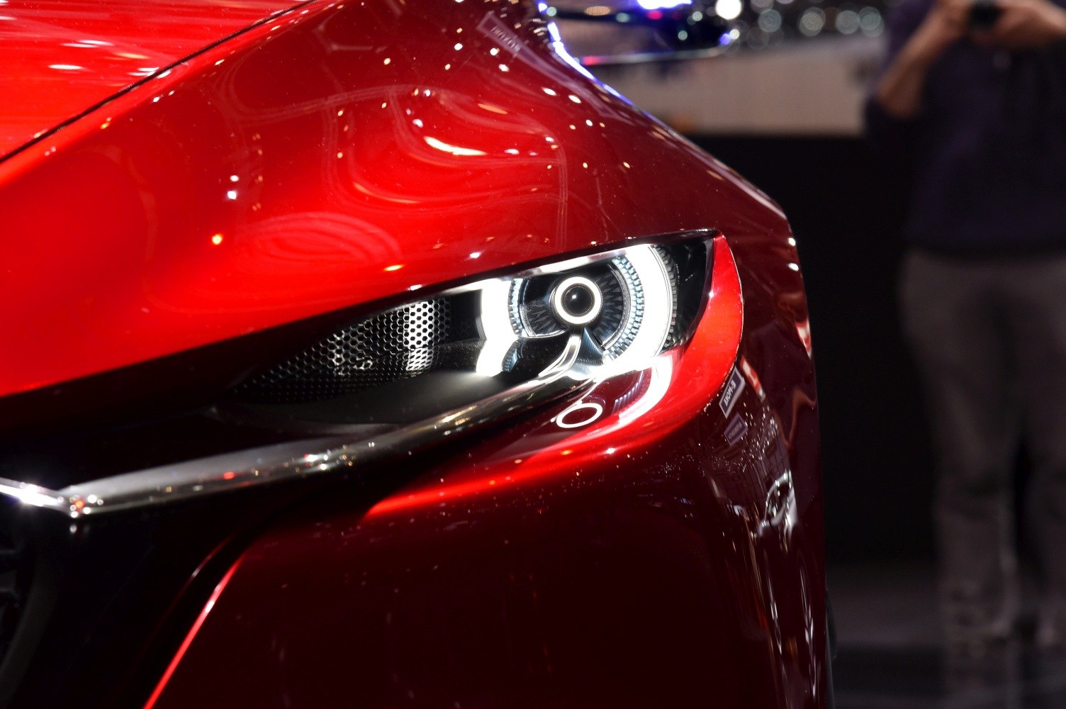 Close-up of 2017 Mazda KAI Concept front LED headlight and front-body details