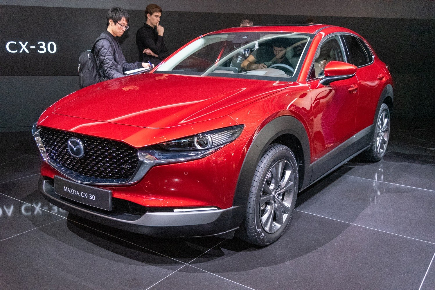 Front view with headlight and alloy wheel details