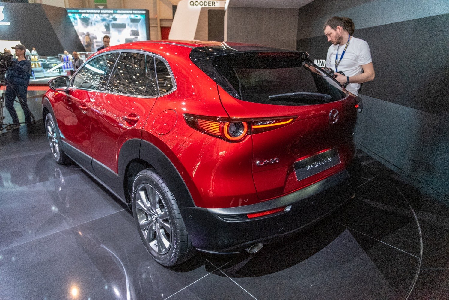Compact SUV rear with circular LED tail lights and alloy wheels