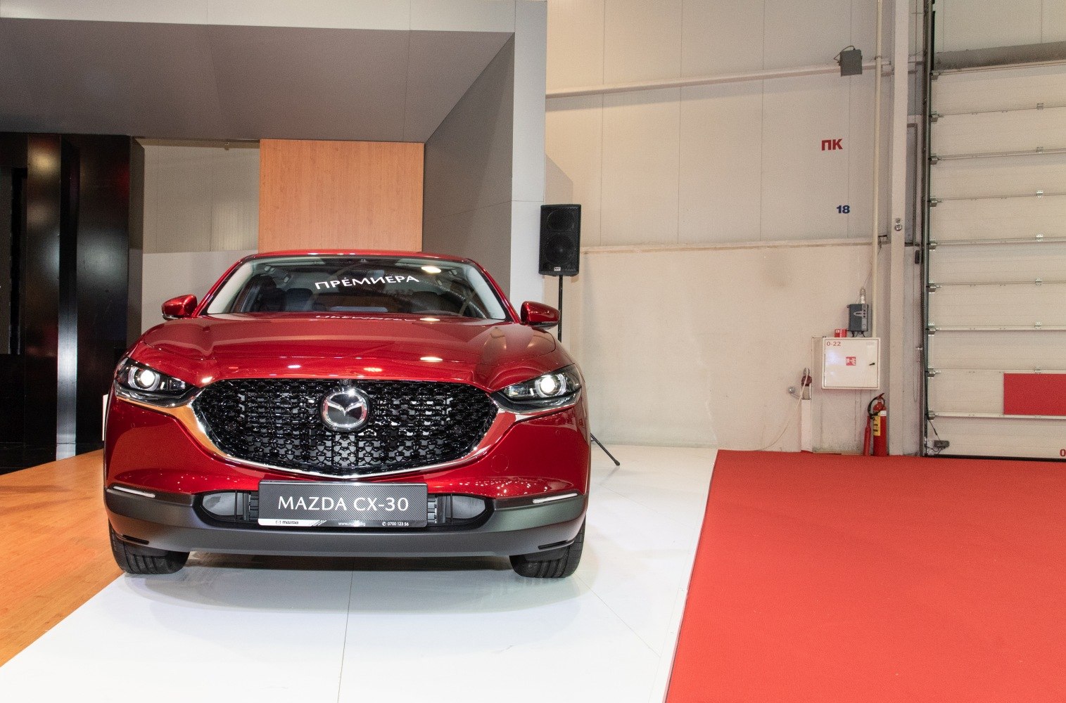Front view with signature grille and LED headlights