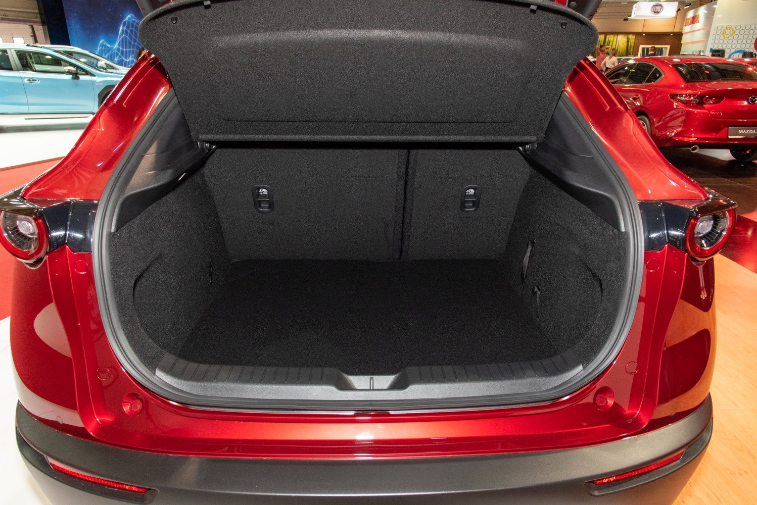 Spacious open trunk interior with rear cargo area and fold-down seatbacks