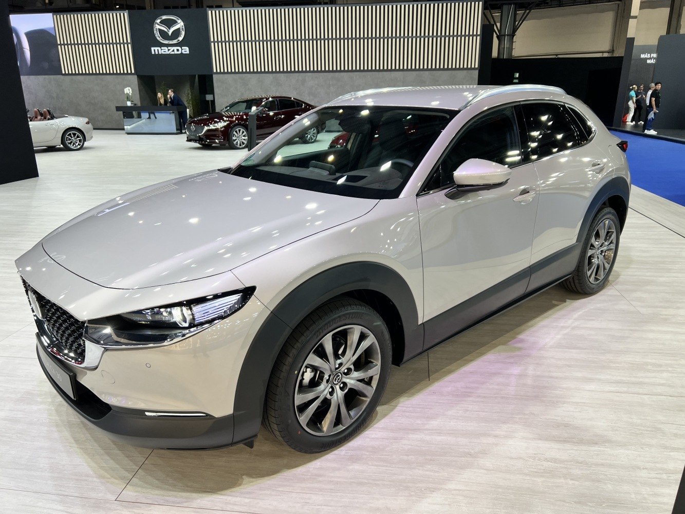 Side-front view of sleek compact crossover with modern grille and alloy wheels