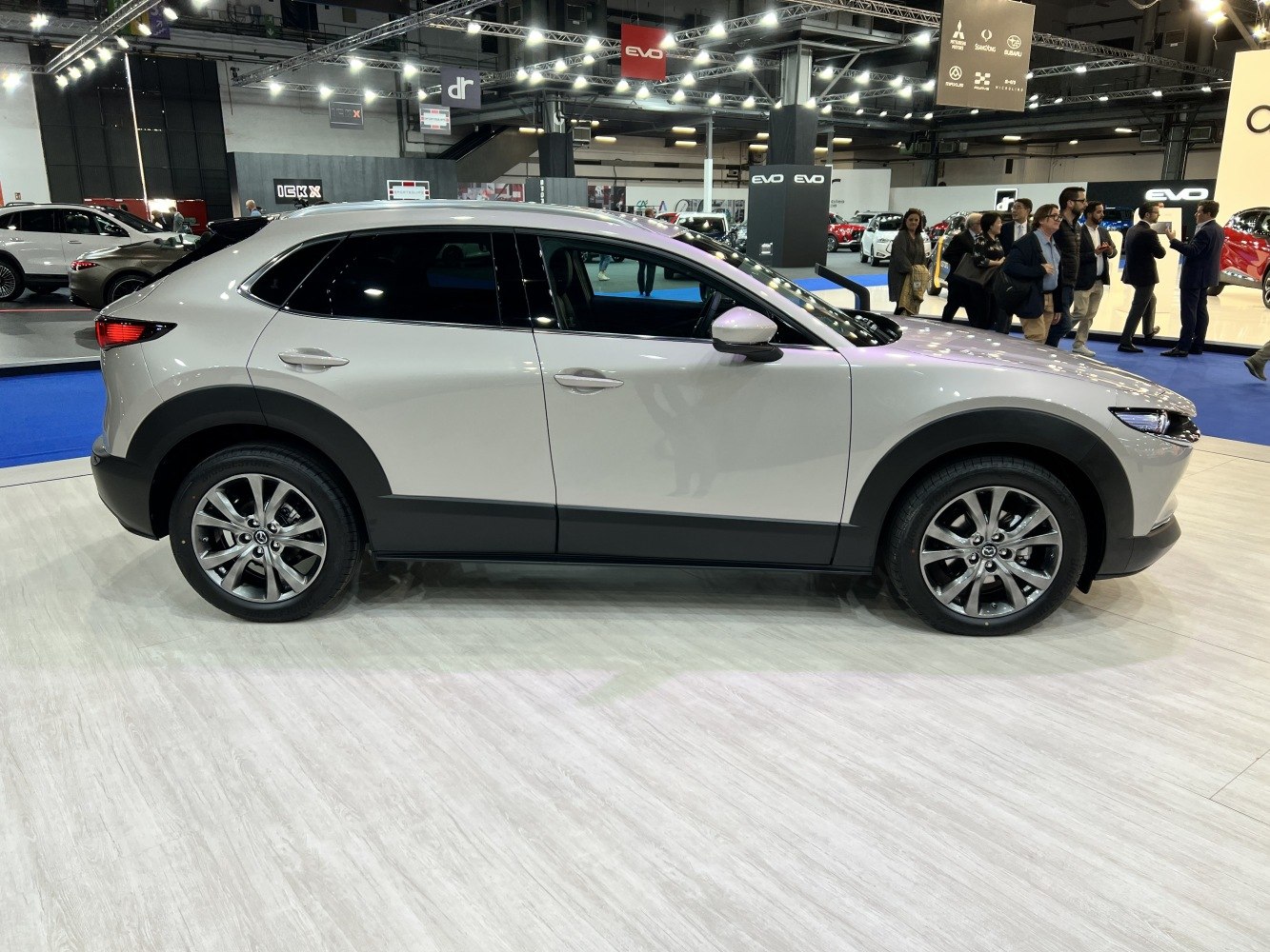 Side profile of a sleek compact crossover with distinct wheel arches